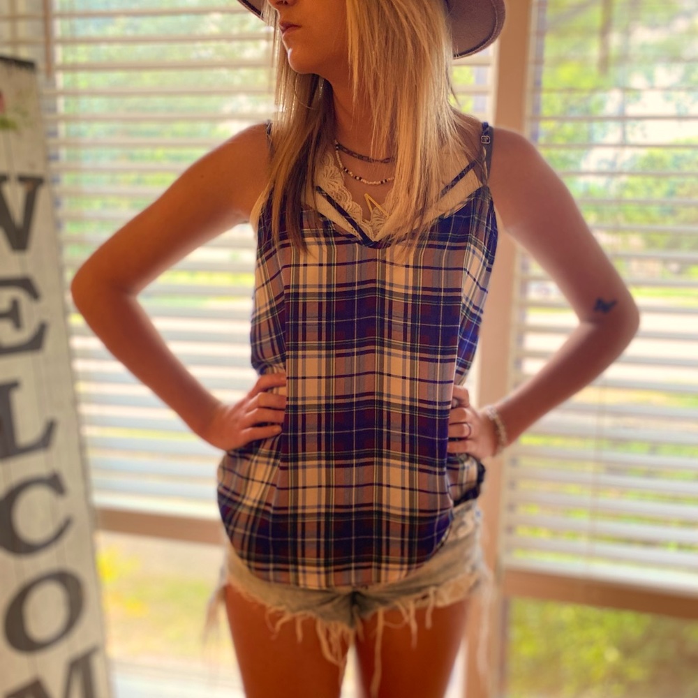 Beautiful tank top with Criss Cross at top! Cute with Bralette! Modeled by XS-S